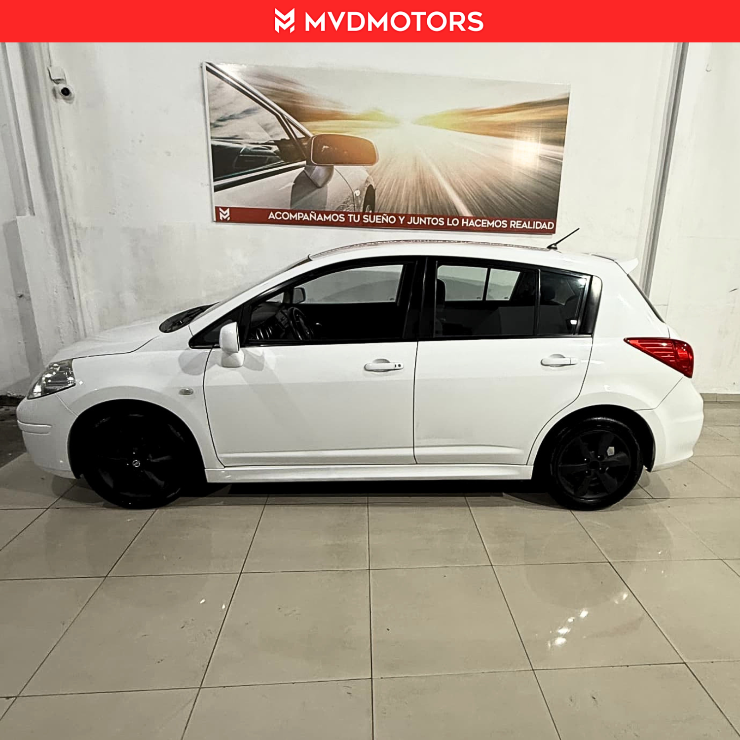 Nissan Tiida hb — foto 5