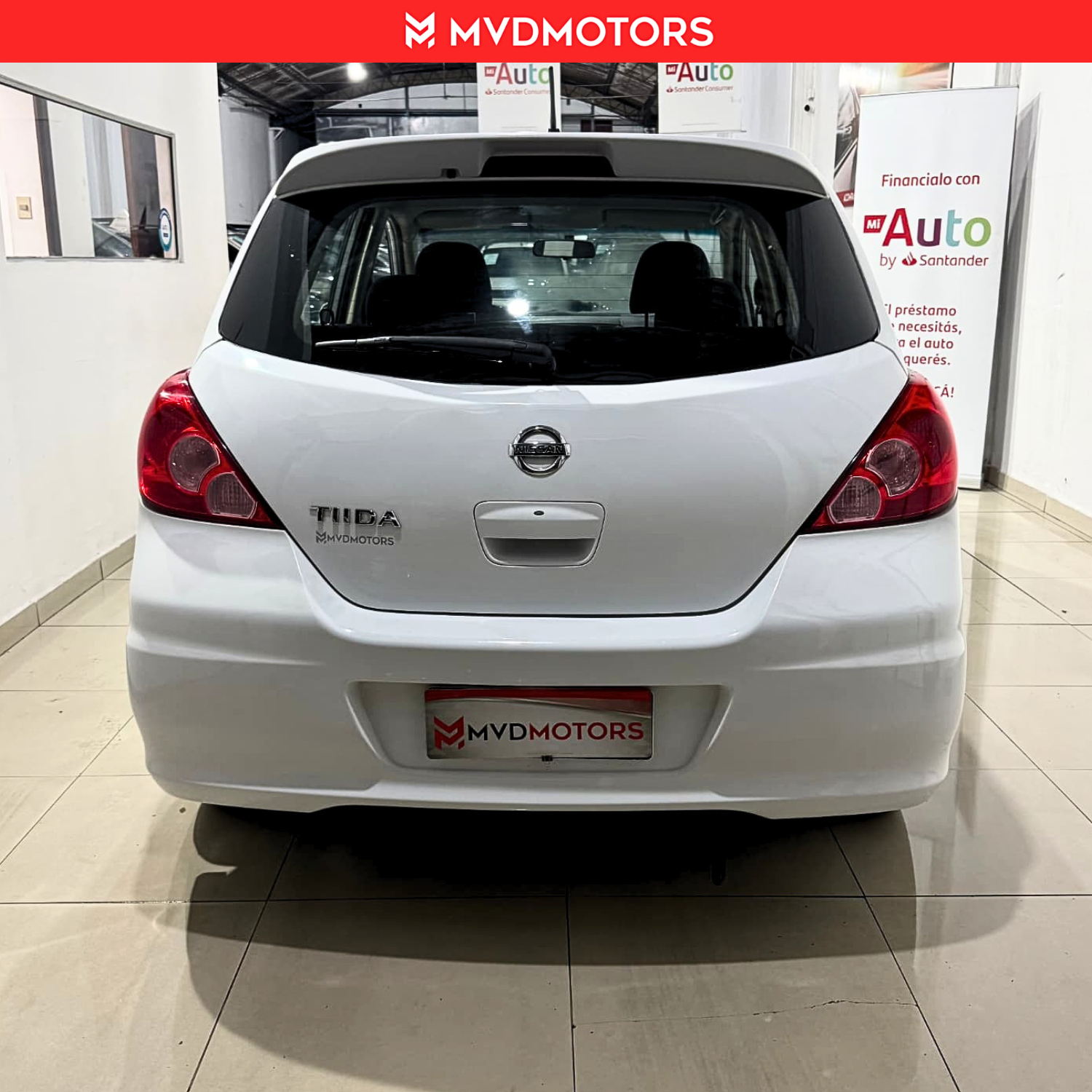 Nissan Tiida hb — foto 7