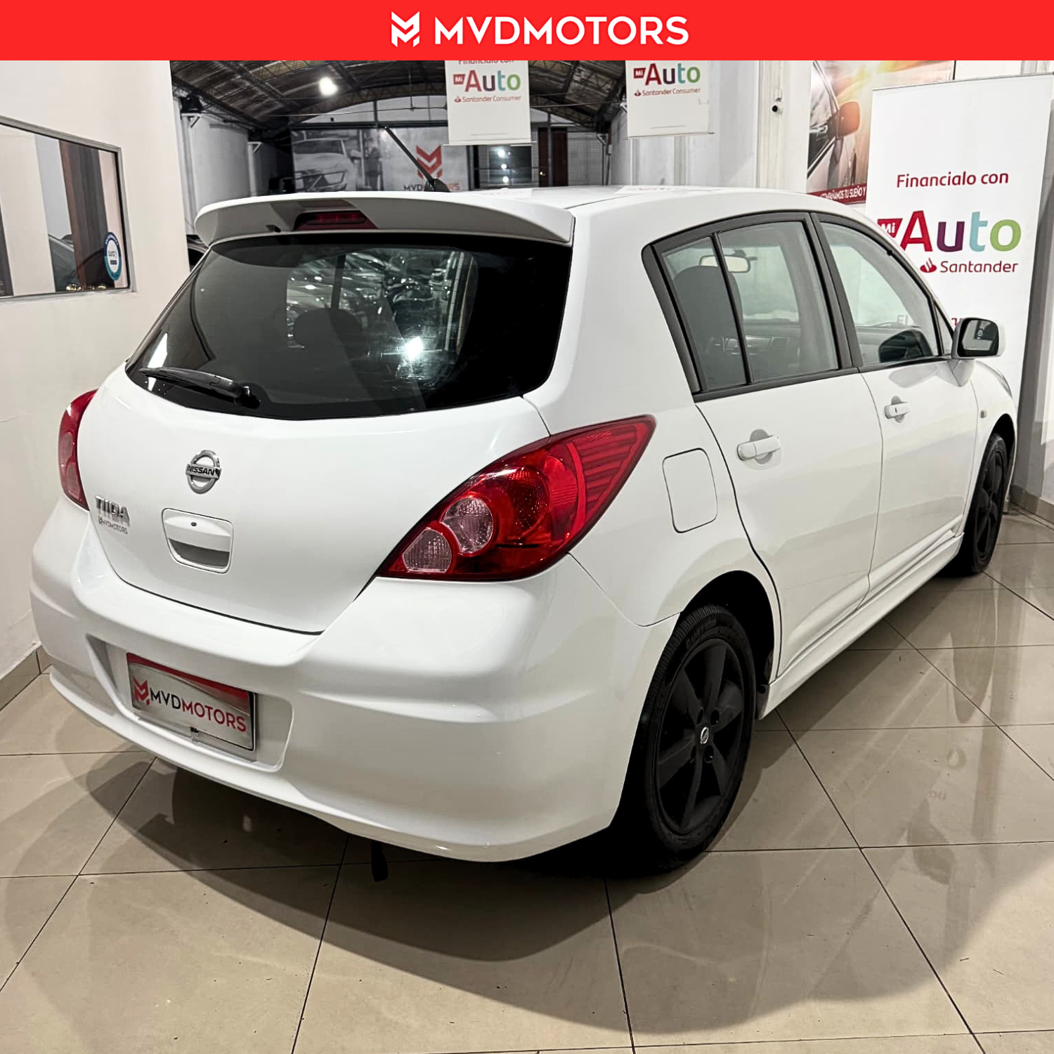 Nissan Tiida hb — foto 6
