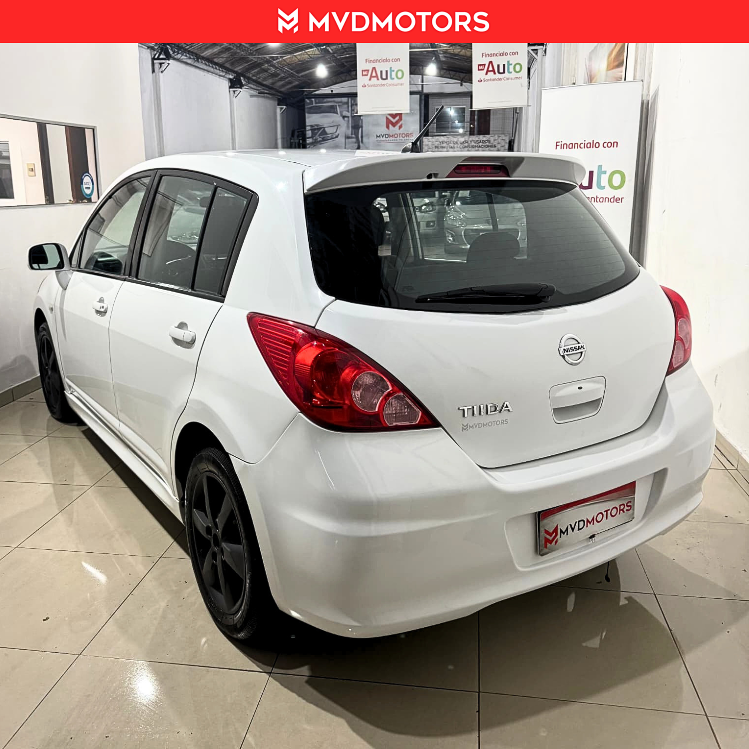 Nissan Tiida hb — foto 8