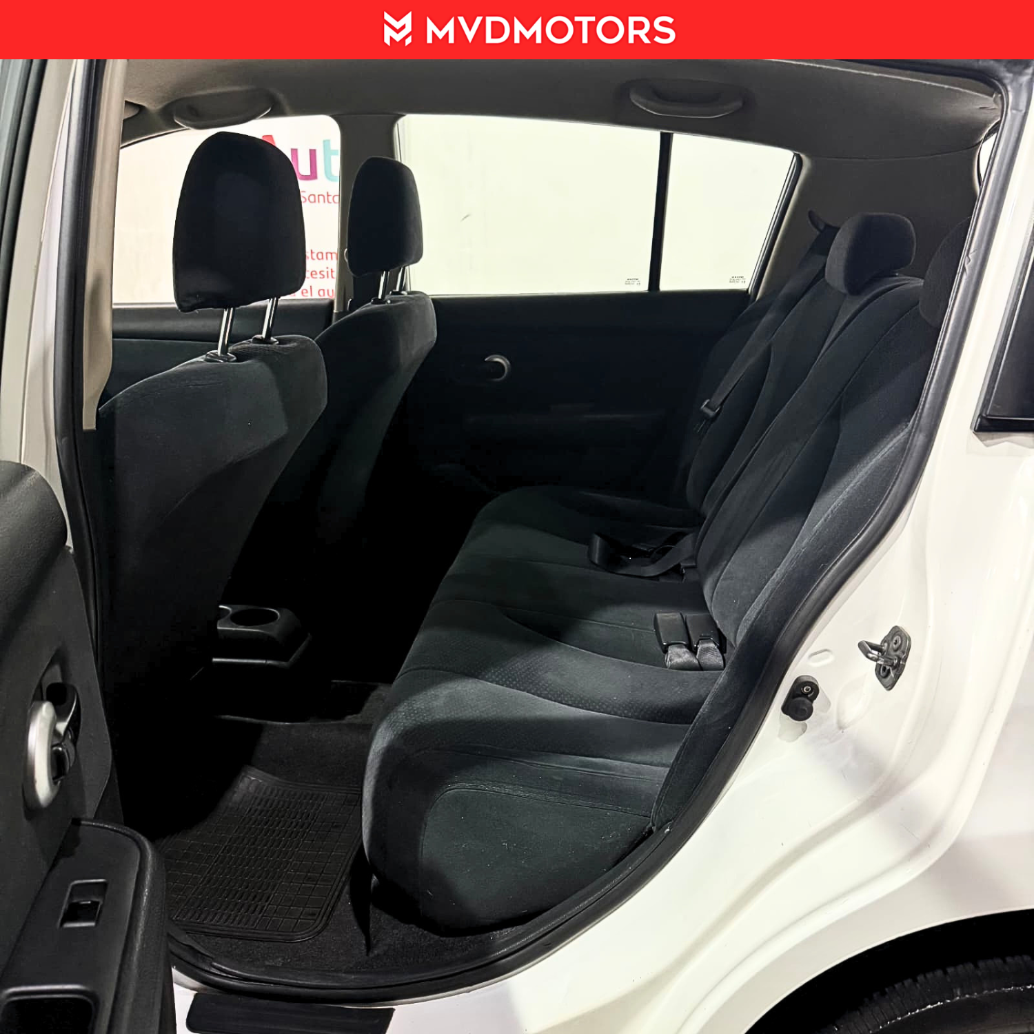 Nissan Tiida hb — foto 11