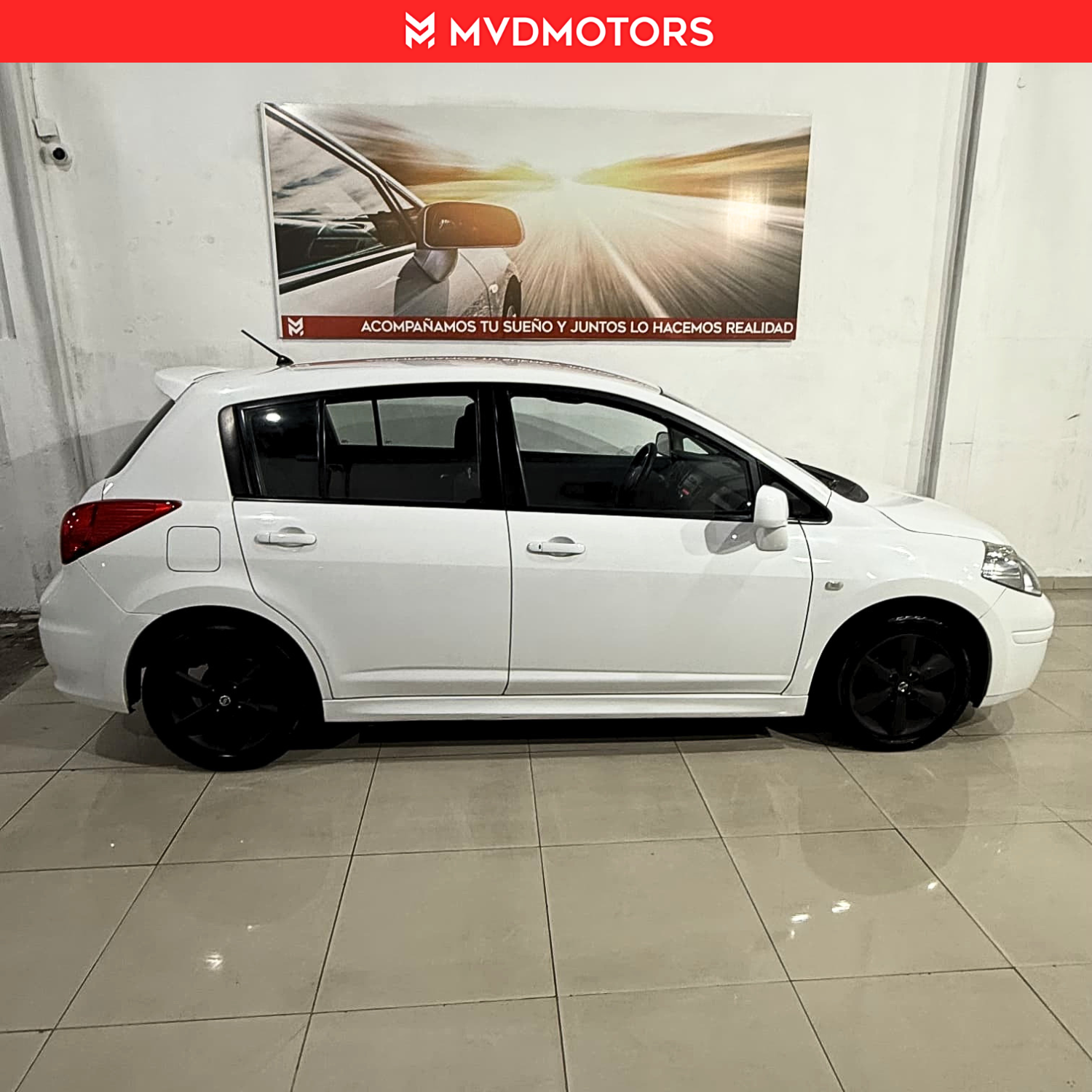 Nissan Tiida hb — foto 4